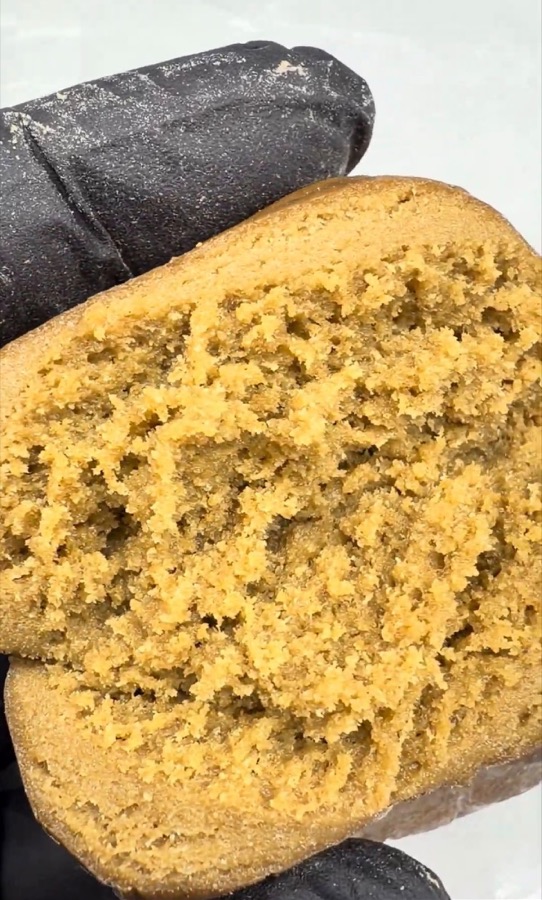 Golden-brown block cut open